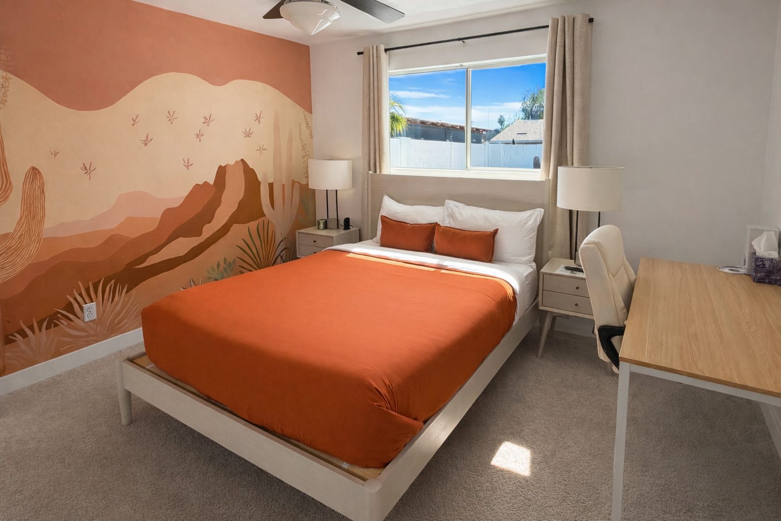 Primary bedroom with orange mural